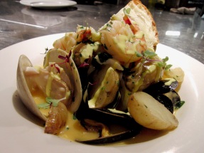 New England bouillabaisse Local cod, Wellfleet littleneck clams, Blue Hill Bay mussels, Blue prawns, fennel, potato, and saffron rouille