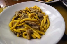 Passatelli with porcini at Osteria Broccaindosso in Bologna